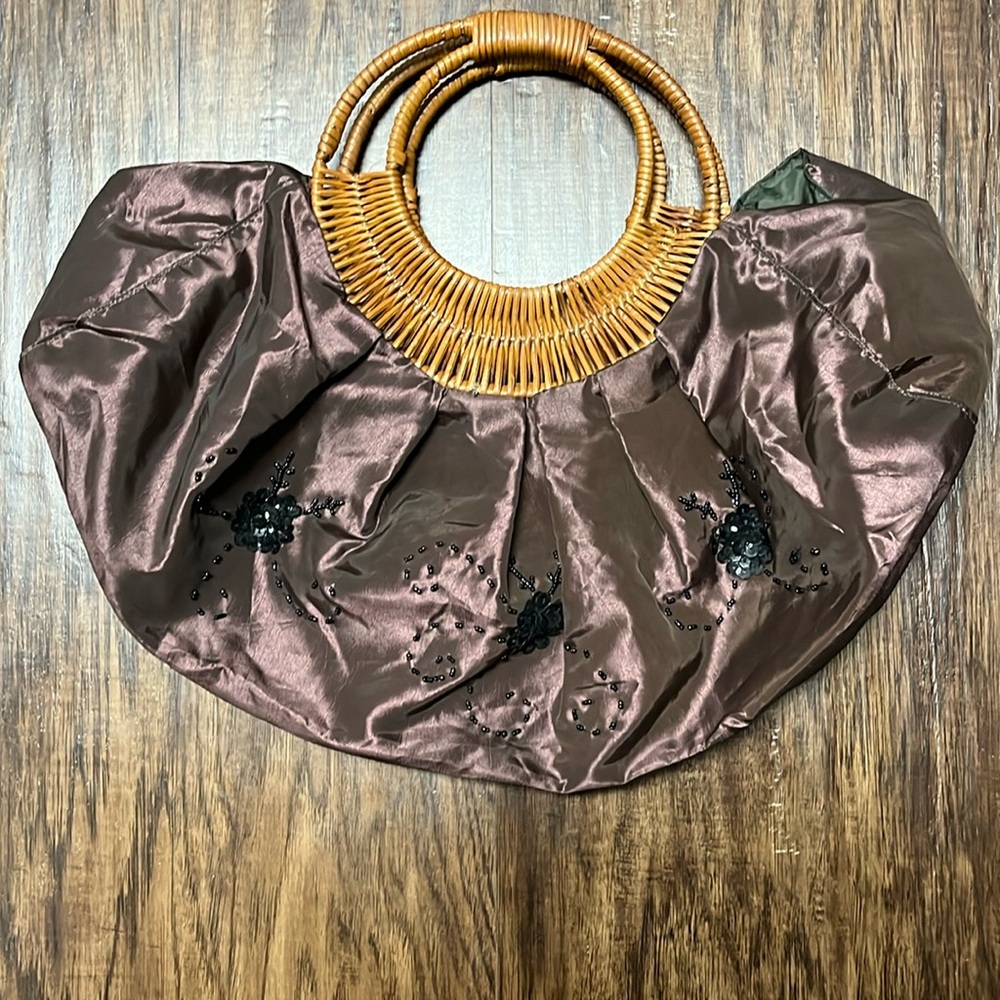 Beautiful top handle purse.